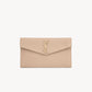 YSL Pochette UPTOWN in pelle goffrata grain de poudre Dark Beige