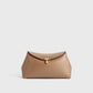 Toteme T-Lock leather clutch camel