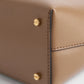 Toteme T-Lock leather clutch camel