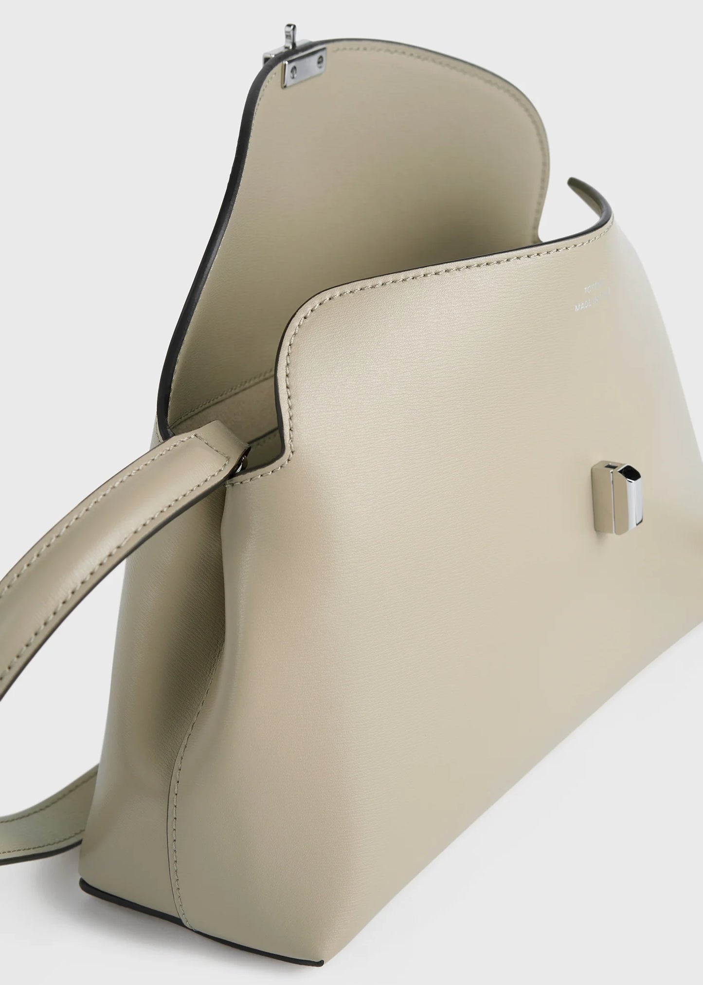 Toteme T-Lock leather clutch fawn